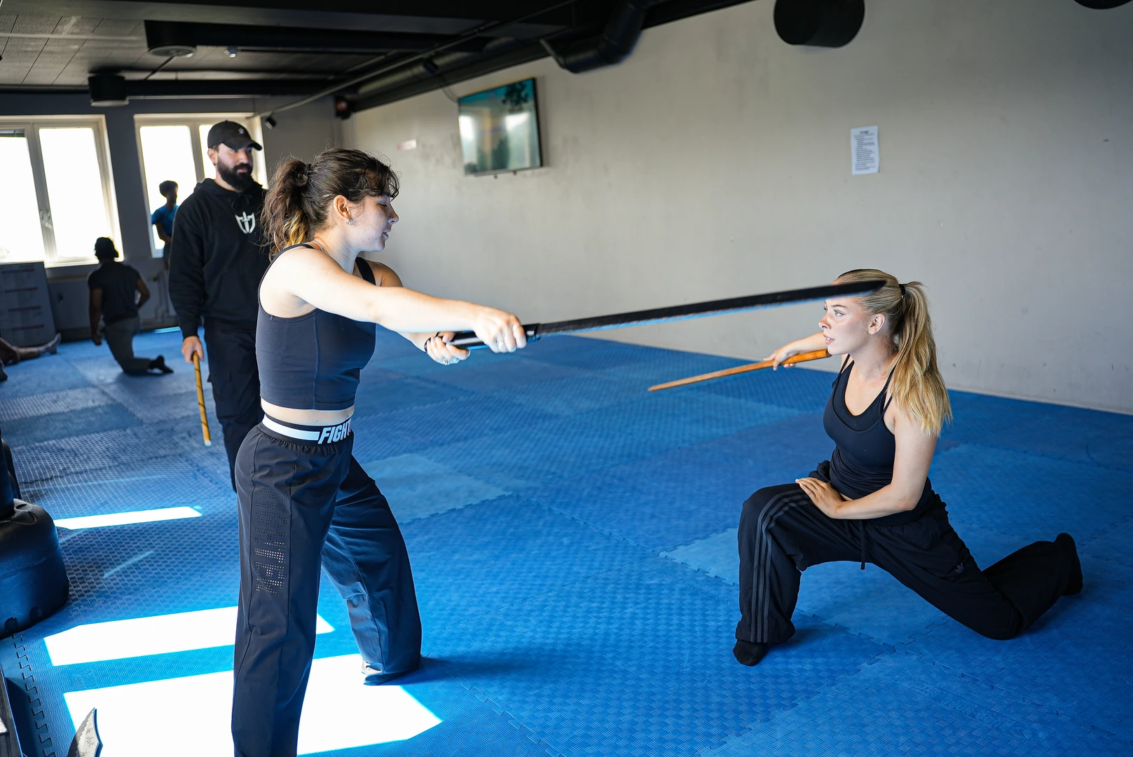Bertan Berber directing and demonstrating choreographed sword action