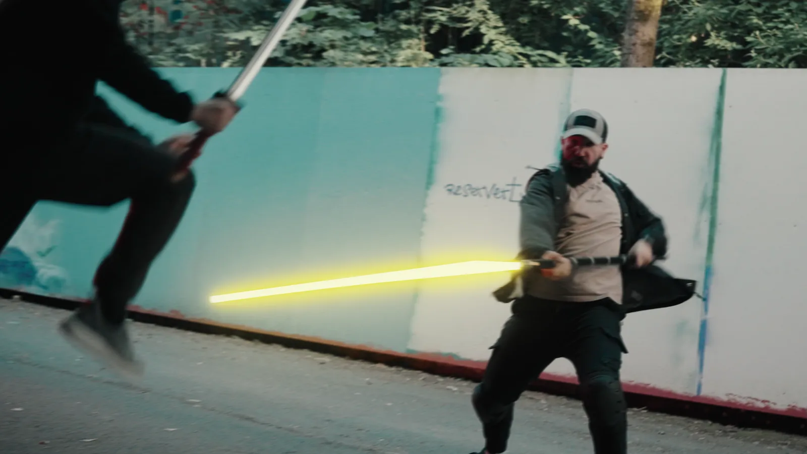 Bertan with a glowing pike facing a fighter with a katana, from Exiled Temple Guard
